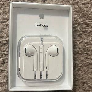 Apple EarPods new, corded, never worn, great condition. With case and box .